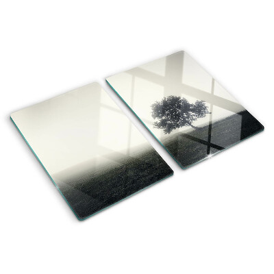 Tagliere in vetro temperato con stampa di un albero in un paesaggio nebbioso