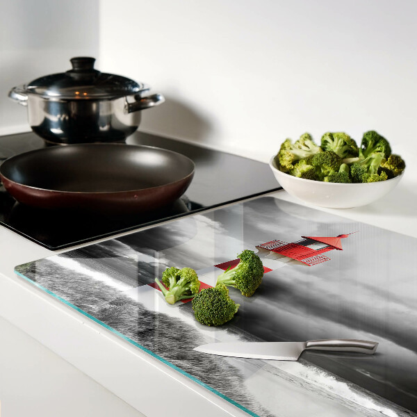 Tagliere in vetro temperato con stampa raffigurante un faro nel paesaggio