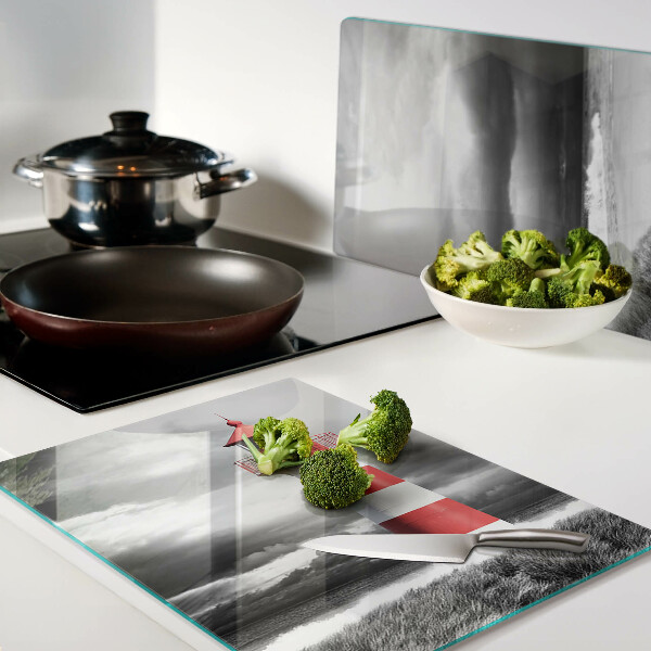 Tagliere in vetro temperato con stampa raffigurante un faro nel paesaggio