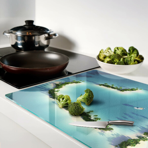 Tagliere in vetro con stampa raffigurante un'isola paradisiaca con palme