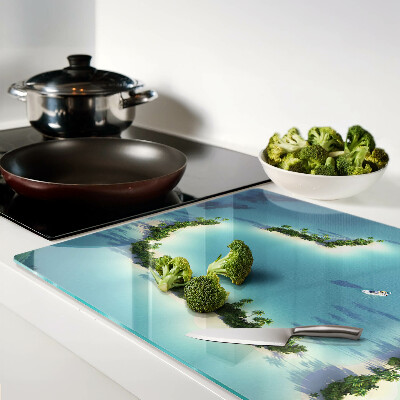 Tagliere in vetro con stampa raffigurante un'isola paradisiaca con palme