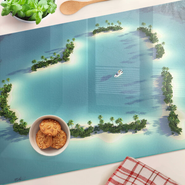 Tagliere in vetro con stampa raffigurante un'isola paradisiaca con palme