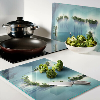 Tagliere in vetro con stampa raffigurante un'isola paradisiaca con palme