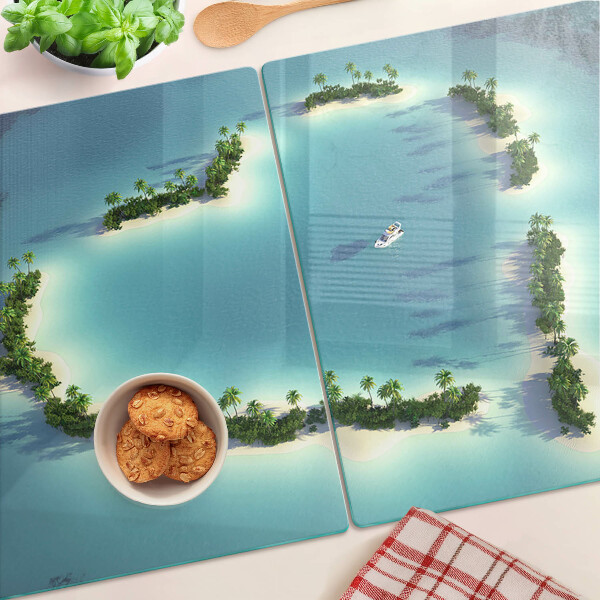 Tagliere in vetro con stampa raffigurante un'isola paradisiaca con palme