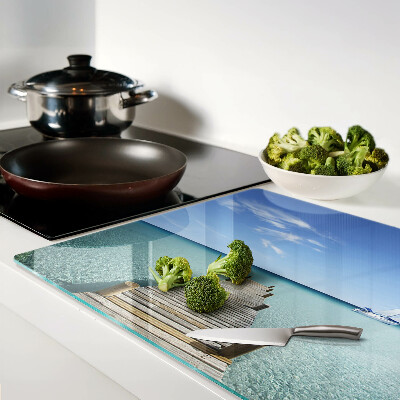 Tagliere in vetro temperato con stampa del pontile sul mare turchese