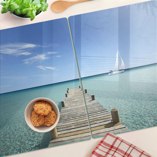 Tagliere in vetro temperato con stampa del pontile sul mare turchese