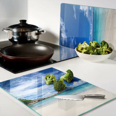 Tagliere in vetro con stampa a tema spiaggia tropicale e cielo azzurro