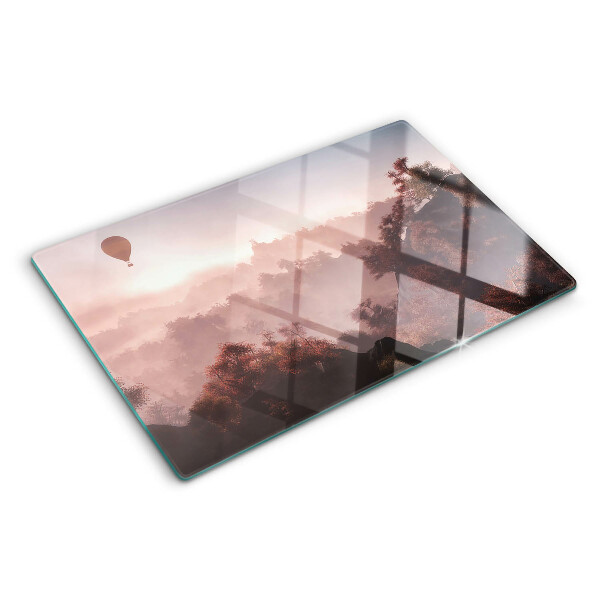 Tagliere in vetro temperato con decorazione a mongolfiera su paesaggio