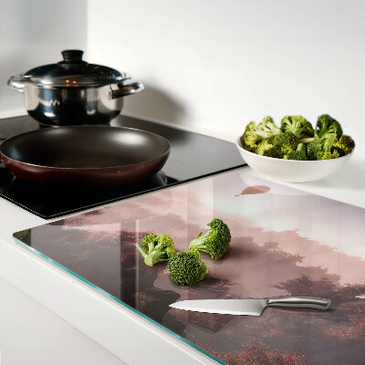 Tagliere in vetro temperato con decorazione a mongolfiera su paesaggio