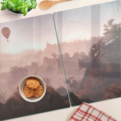 Tagliere in vetro temperato con decorazione a mongolfiera su paesaggio