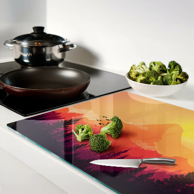 Tagliere in vetro temperato con stampa di un paesaggio montano al tramonto