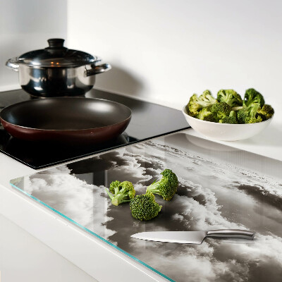 Tagliere in vetro temperato con decorazione a nuvole nei toni del grigio