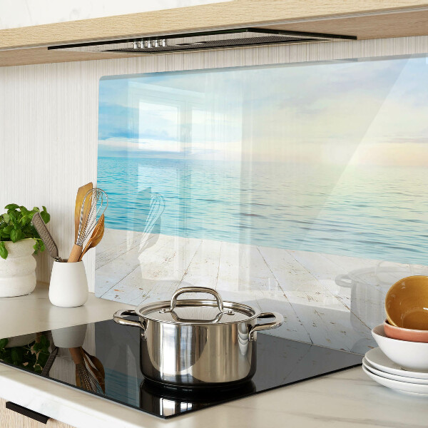 Tagliere in vetro con stampa raffigurante il mare e un pontile di legno