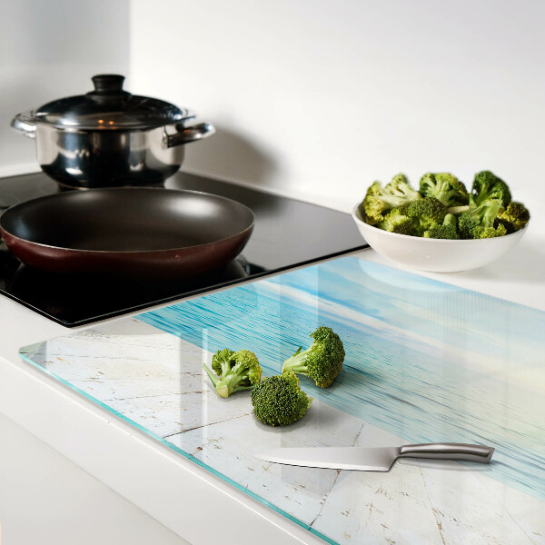 Tagliere in vetro con stampa raffigurante il mare e un pontile di legno