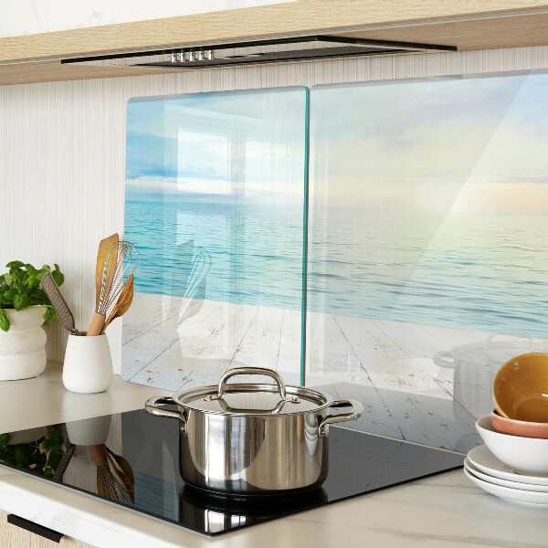 Tagliere in vetro con stampa raffigurante il mare e un pontile di legno