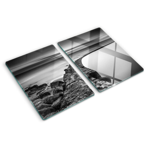 Tagliere in vetro temperato con stampa di un paesaggio costiero nei toni del grigio