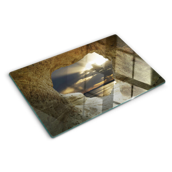 Tagliere in vetro temperato con stampa raffigurante la vista sul mare attraverso una grotta