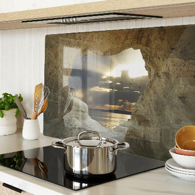 Tagliere in vetro temperato con stampa raffigurante la vista sul mare attraverso una grotta