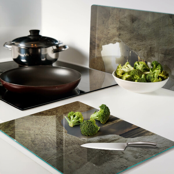 Tagliere in vetro temperato con stampa raffigurante la vista sul mare attraverso una grotta