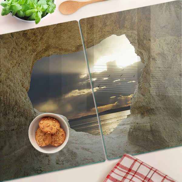 Tagliere in vetro temperato con stampa raffigurante la vista sul mare attraverso una grotta