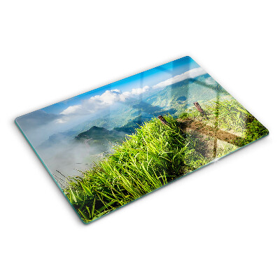 Tagliere in vetro temperato con motivo paesaggio montano in tonalità verdi