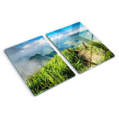 Tagliere in vetro temperato con motivo paesaggio montano in tonalità verdi