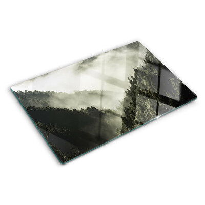 Tagliere in vetro temperato con stampa di un paesaggio montano avvolto nella nebbia