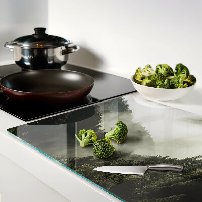 Tagliere in vetro temperato con stampa di un paesaggio montano avvolto nella nebbia