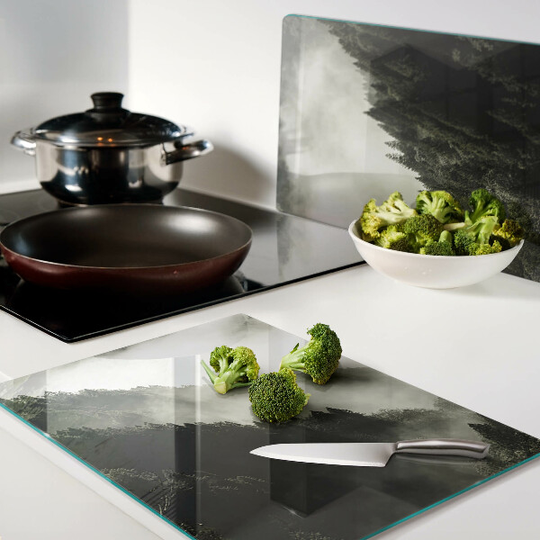 Tagliere in vetro temperato con stampa di un paesaggio montano avvolto nella nebbia