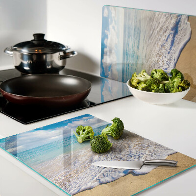 Tagliere in vetro temperato con decoro spiaggia con onde e nuvole