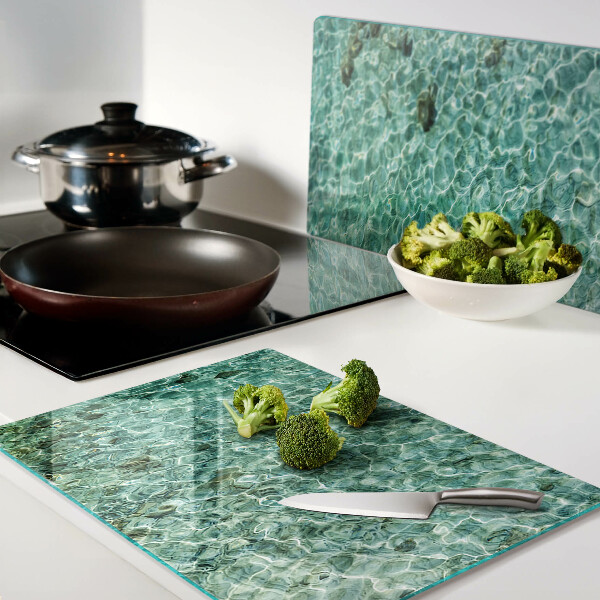 Tagliere in vetro con motivo acqua a effetto piscina