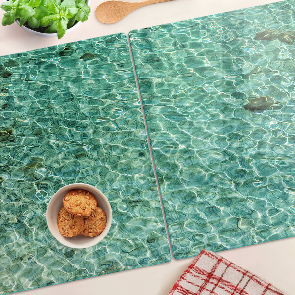 Tagliere in vetro con motivo acqua a effetto piscina