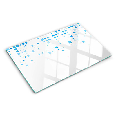 Tagliere in vetro con motivo di quadrati blu su sfondo bianco