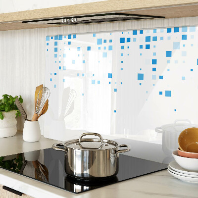 Tagliere in vetro con motivo di quadrati blu su sfondo bianco