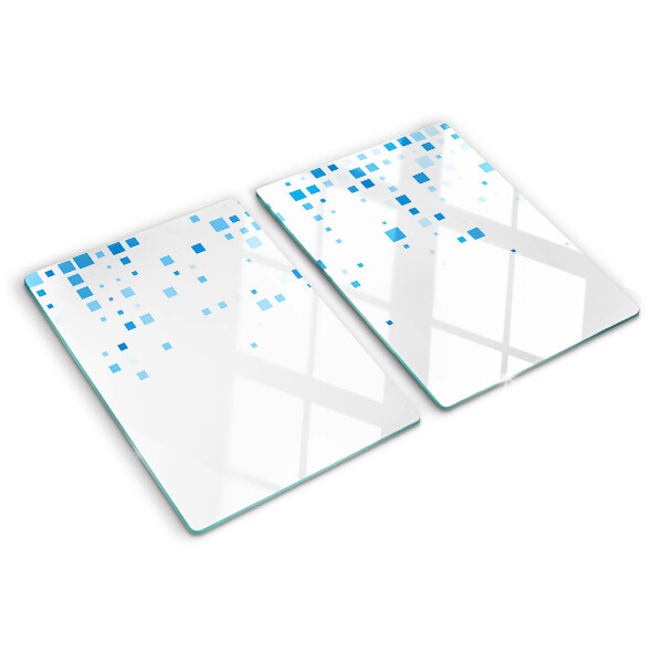 Tagliere in vetro con motivo di quadrati blu su sfondo bianco