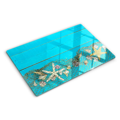Tagliere in vetro temperato Conchiglie e stelle marine in rete