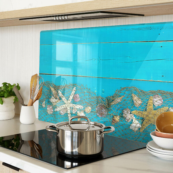 Tagliere in vetro temperato con decorazione di conchiglie e stelle marine