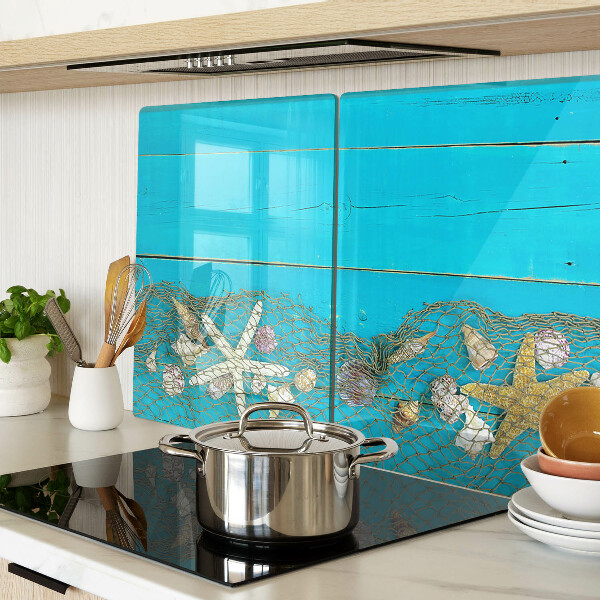 Tagliere in vetro temperato con decorazione di conchiglie e stelle marine