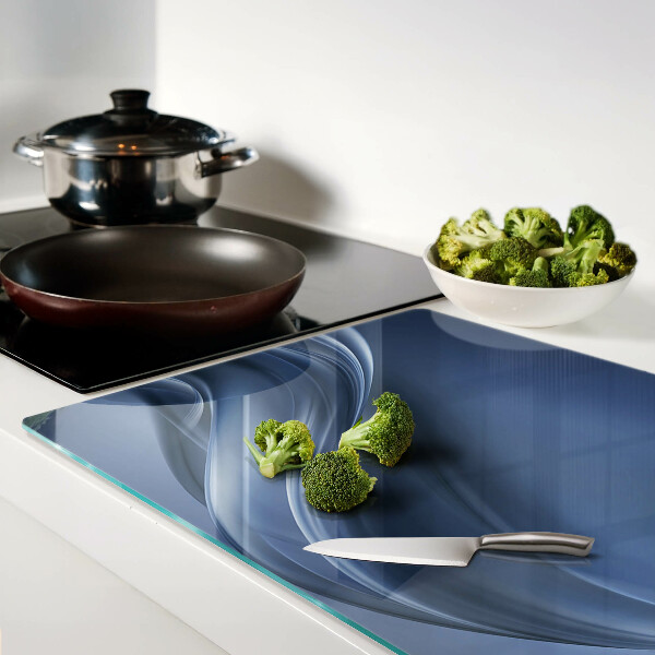 Tagliere in vetro con motivo a onde nei toni del blu