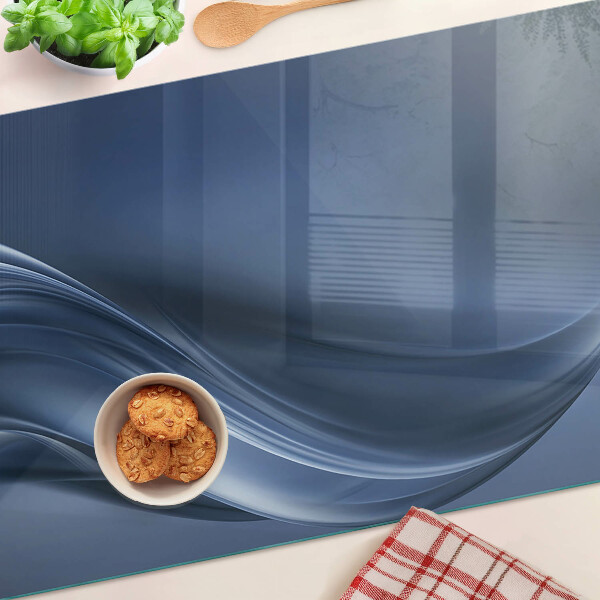 Tagliere in vetro con motivo a onde nei toni del blu