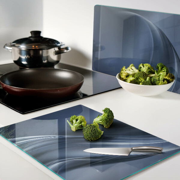 Tagliere in vetro con motivo a onde nei toni del blu