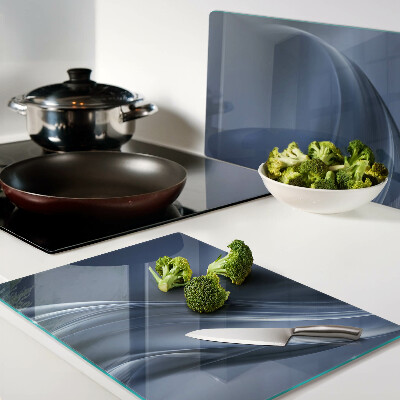 Tagliere in vetro con motivo a onde nei toni del blu