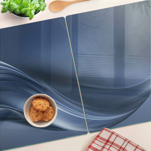 Tagliere in vetro con motivo a onde nei toni del blu