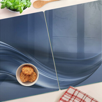 Tagliere in vetro con motivo a onde nei toni del blu