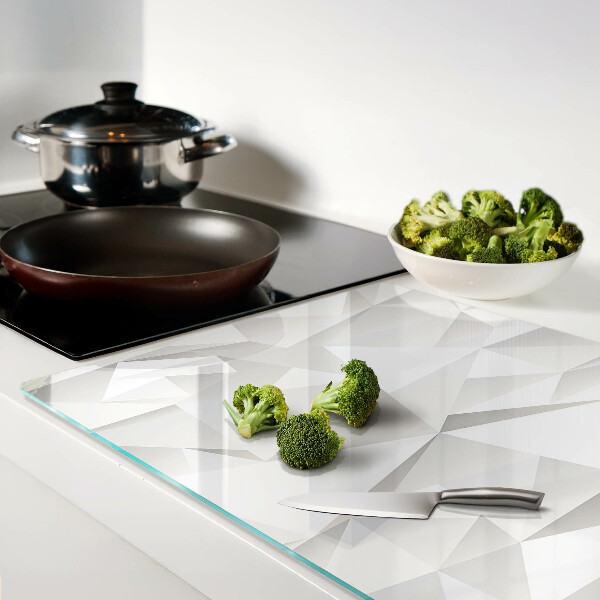 Tagliere in vetro temperato con motivo a solidi geometrici