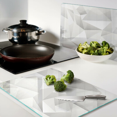 Tagliere in vetro temperato con motivo a solidi geometrici