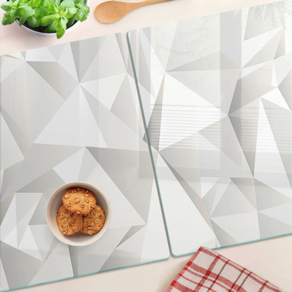 Tagliere in vetro temperato con motivo a solidi geometrici