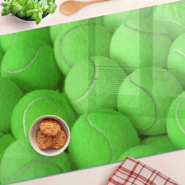 Tagliere in vetro temperato con motivo di palle da tennis su sfondo verde