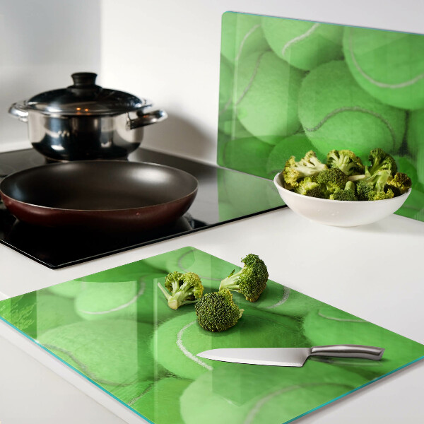 Tagliere in vetro temperato con motivo di palle da tennis su sfondo verde