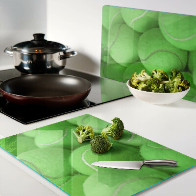 Tagliere in vetro temperato con motivo di palle da tennis su sfondo verde